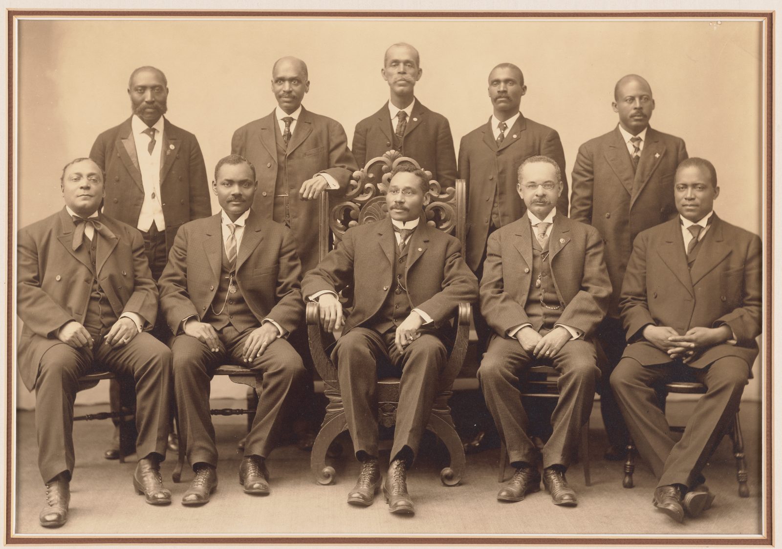 Seated from left to right: / Edward H. Morris, Counsel, Chicago, Illinois / Louis N. Parker, Deputy Grand Master, Little Rock, Arkansas / William L. Houston, Grand Master, Washington, D.C. / James F. Needham , Grand Secretary, Philadelphia, Pennsylvania / Benjamin J. Davis, Grand Treasurer, Atlanta, Georgia / Standing left to right: / W.W. Lawrence, Grand Director, New Bern, North Carolina / Julius C. Johnson, Grand Director, Jacksonville, Florida / A. T. Shirley, Grand Director, Herndon, Virginia / Thomas P. Woodland, Grand Director, New Orleans, Louisiana. Courtesy NMAAHC