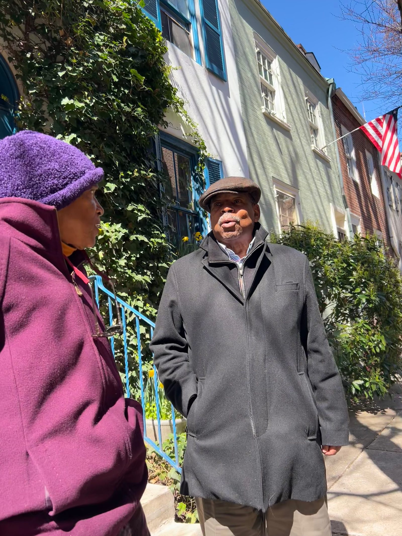 Melvin and Delores Walters on Quince, standing in front of her ancestors home.