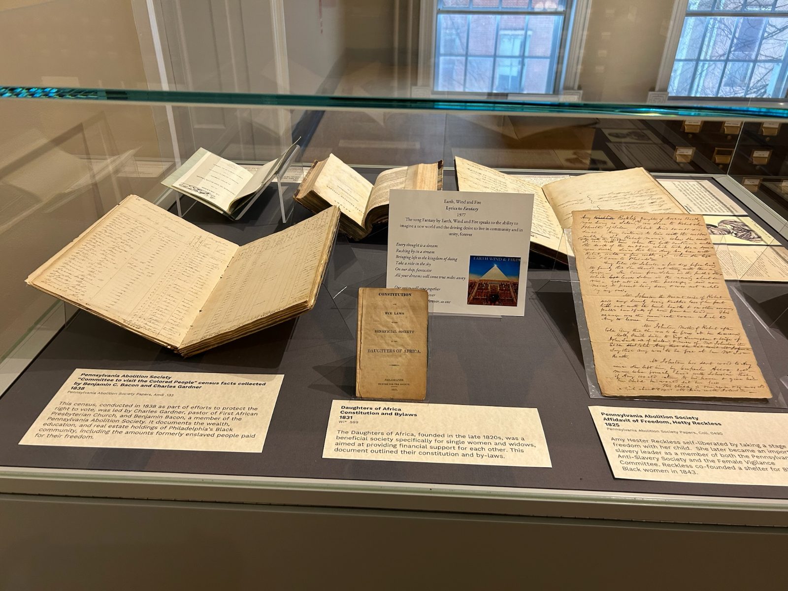 Exhibit case with the 1838 PAS census and Daughters of Africa constitution